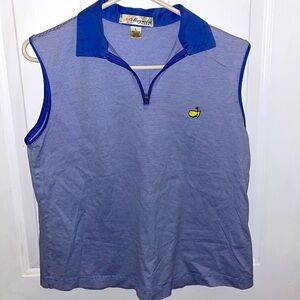 Magnolia Lane Masters blue zip up sleeveless golf shirt.